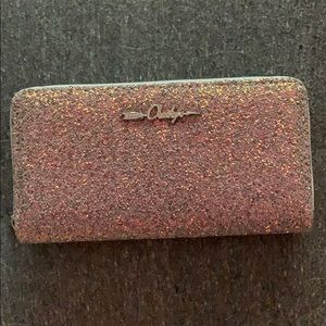 BNWOT Silver glitter wallet.